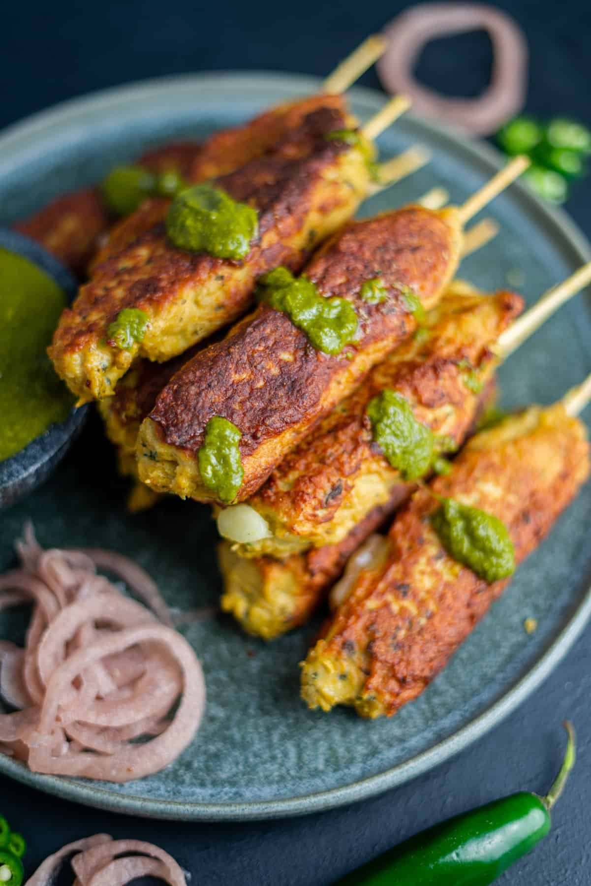 Chicken Seekh Kebabs with Garnish and Cilantro Chutney