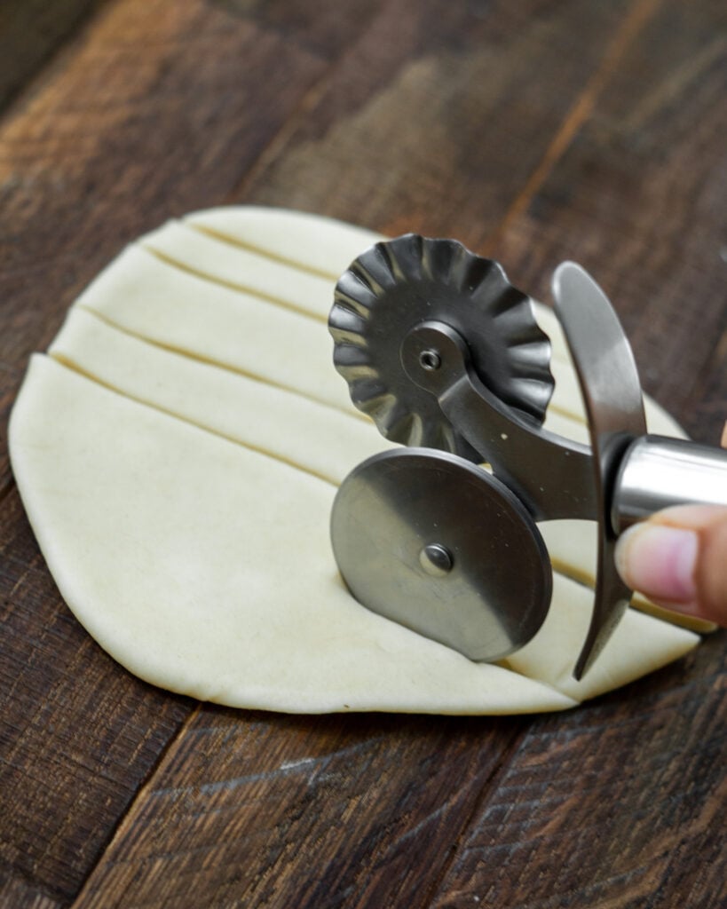 Cutting Pici Pasta Dough into Strips