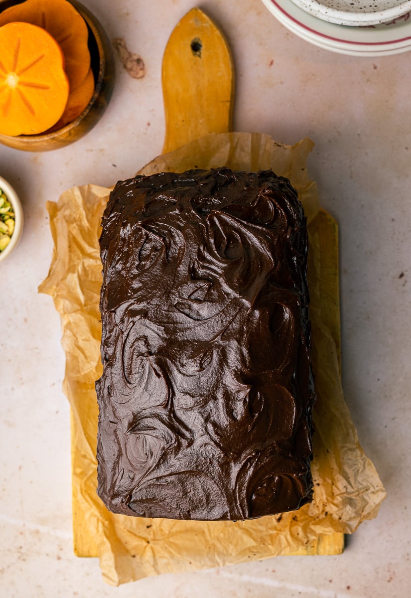 Chocolate Loaf Cake with Chocolate Ganache Swirls and persimmon slices