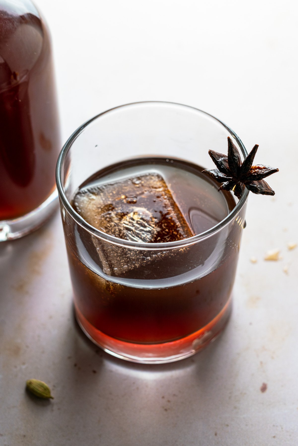 Chai Liqueur in glass with star anise garnish