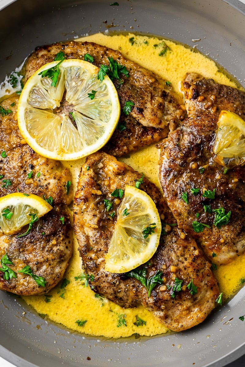 Creamy Garam Masala Lemon Butter Chicken in Pan Close up