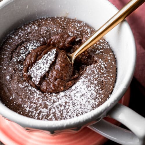 Nutella Mug Cake with a spoon in the Molten Center