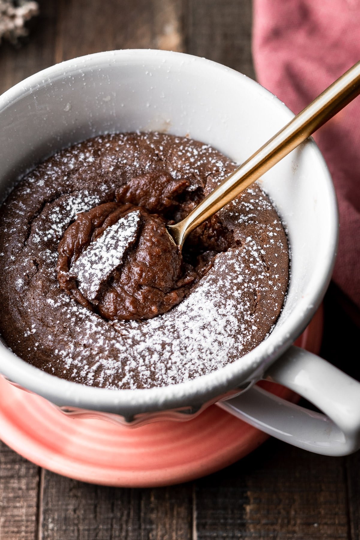 Nutella Mug Cake with a spoon in the Molten Center