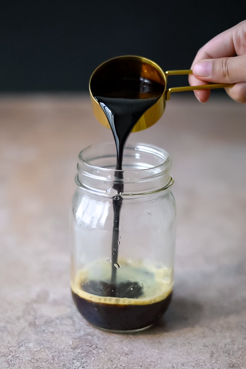 Pour Brown Sugar Syrup in a Mason Jar with espresso