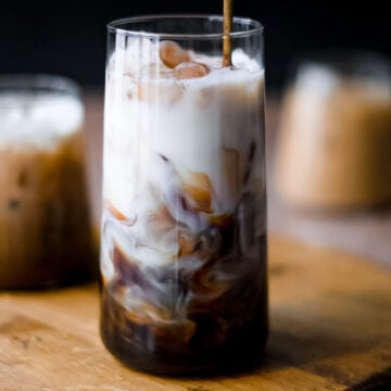 Mixing Milk with Coffee in a Glass