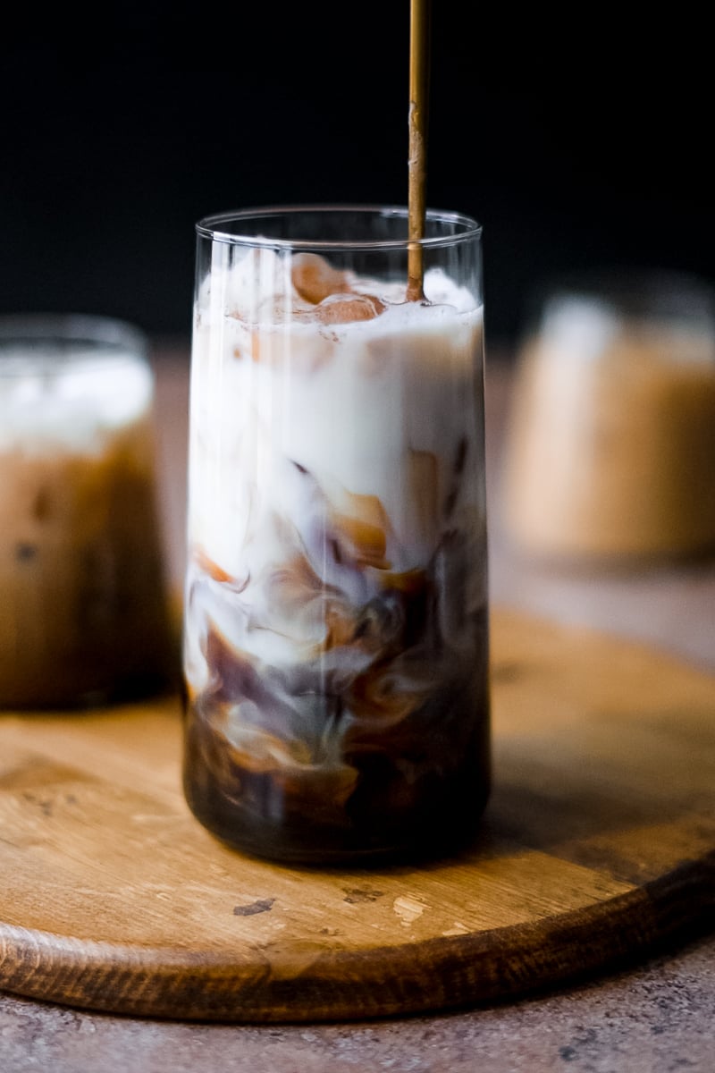 Mixing Milk with Coffee in a Glass