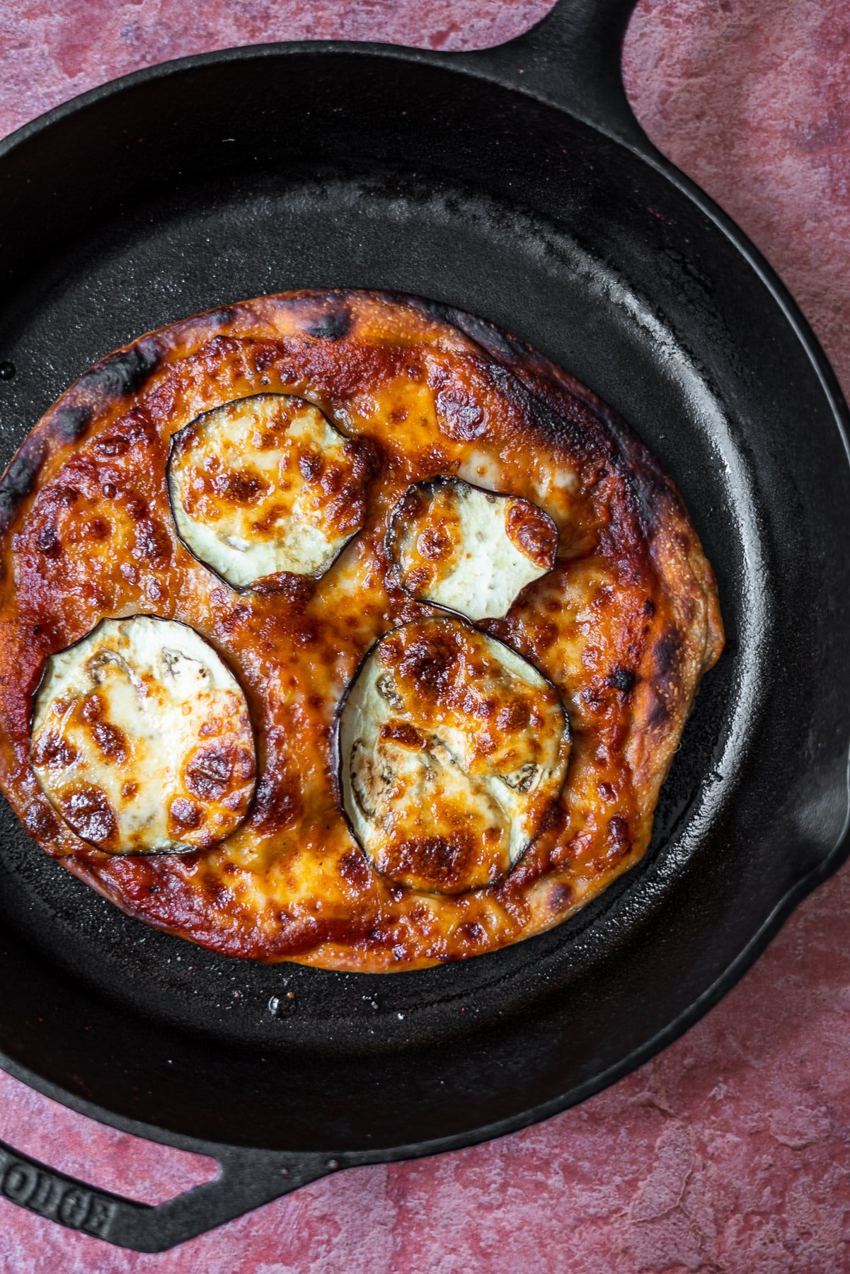 Eggplant Parm Pizza in a cast iron pan