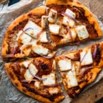 paneer makhani pizza on a wooden board