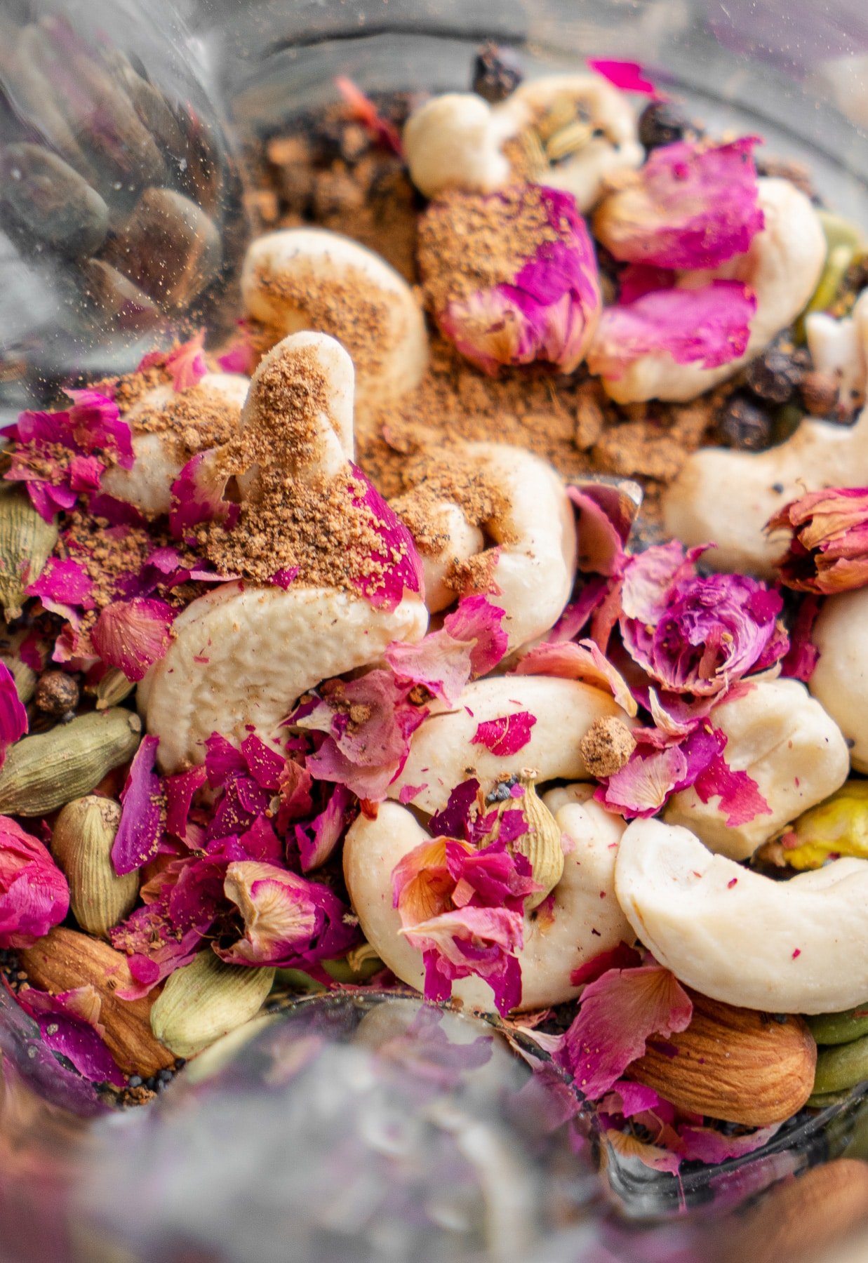 thandai masala ingredients in a blender