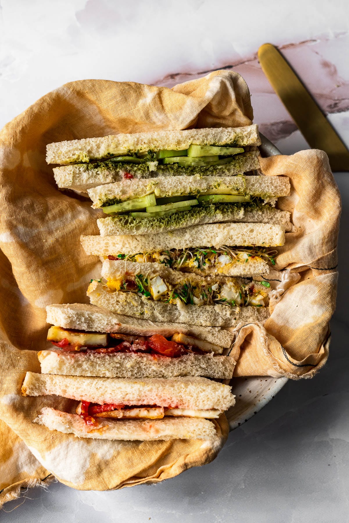 https://masalaandchai.com/wp-content/uploads/2021/04/Indian-Style-Tea-Sandwiches-Cut-Triangles.jpg