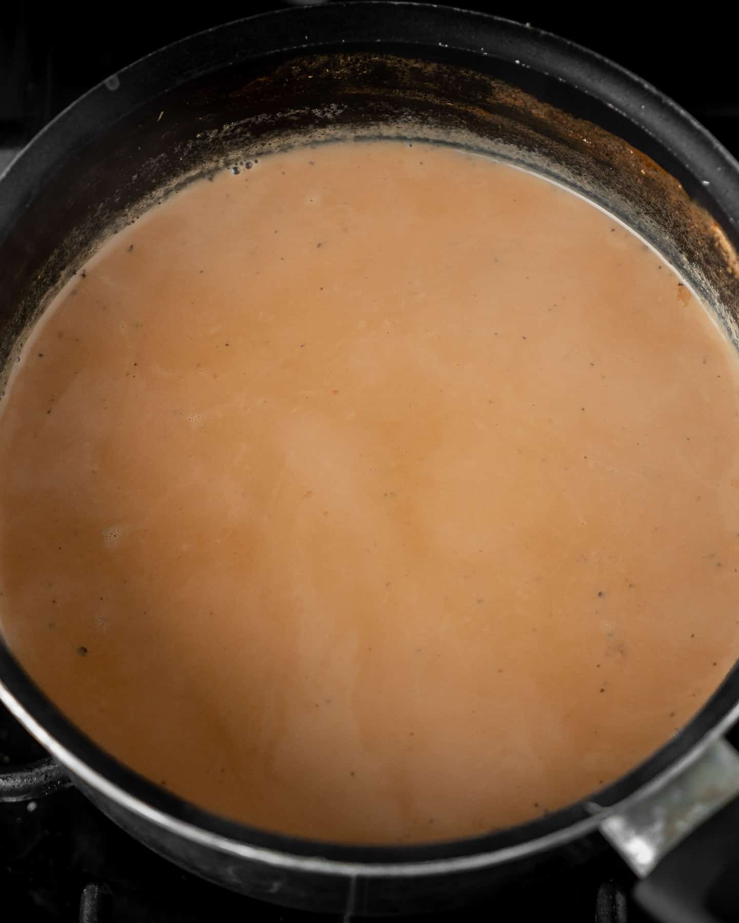 prepared chai boiled in a pot
