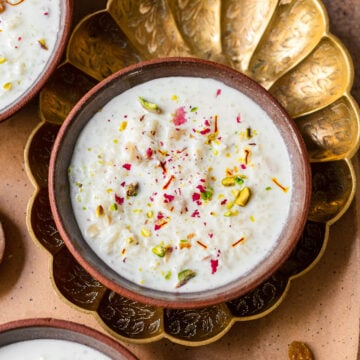 bowl of kheer in a brass platter