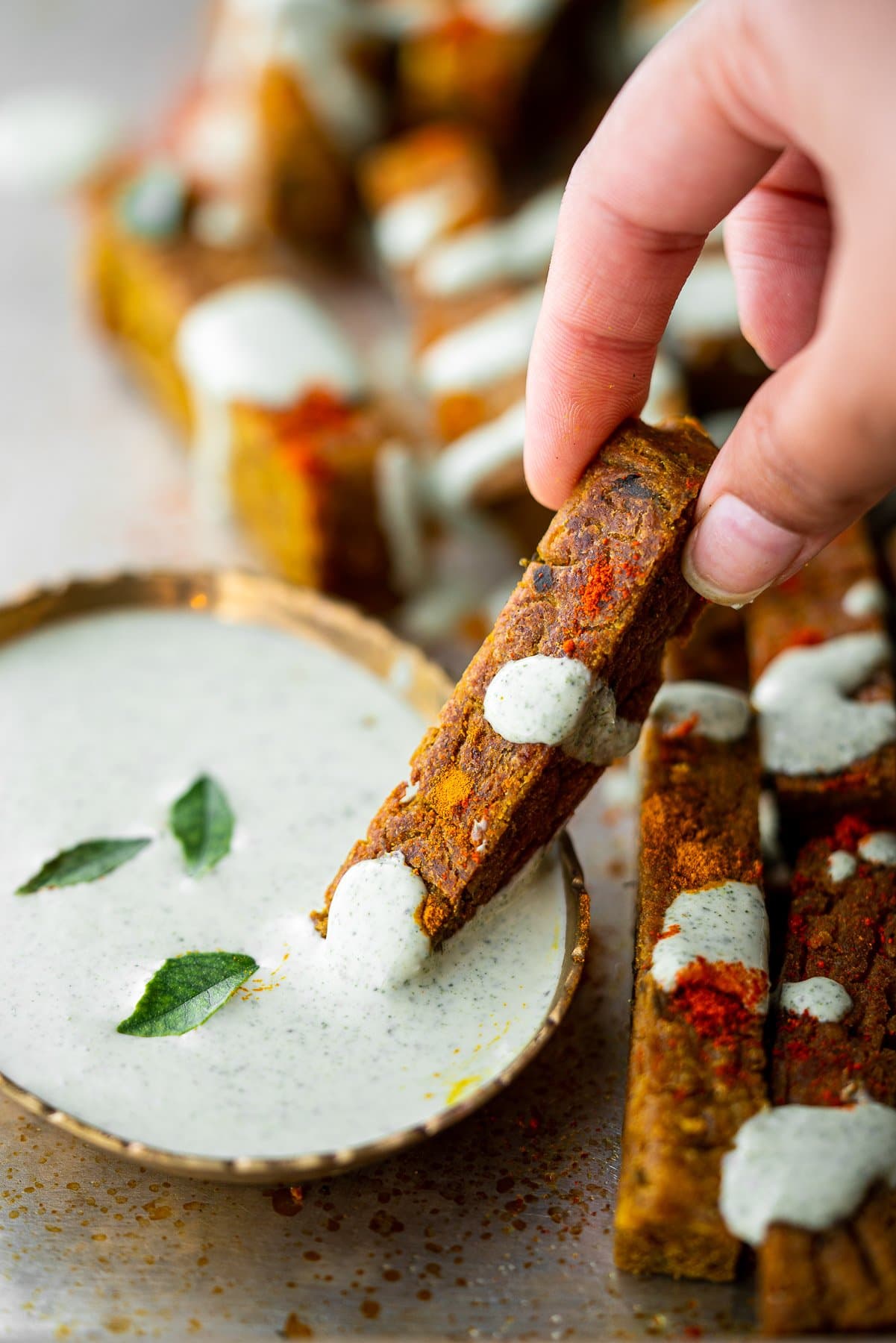 dipping chickpea fry in curry leaf ranch