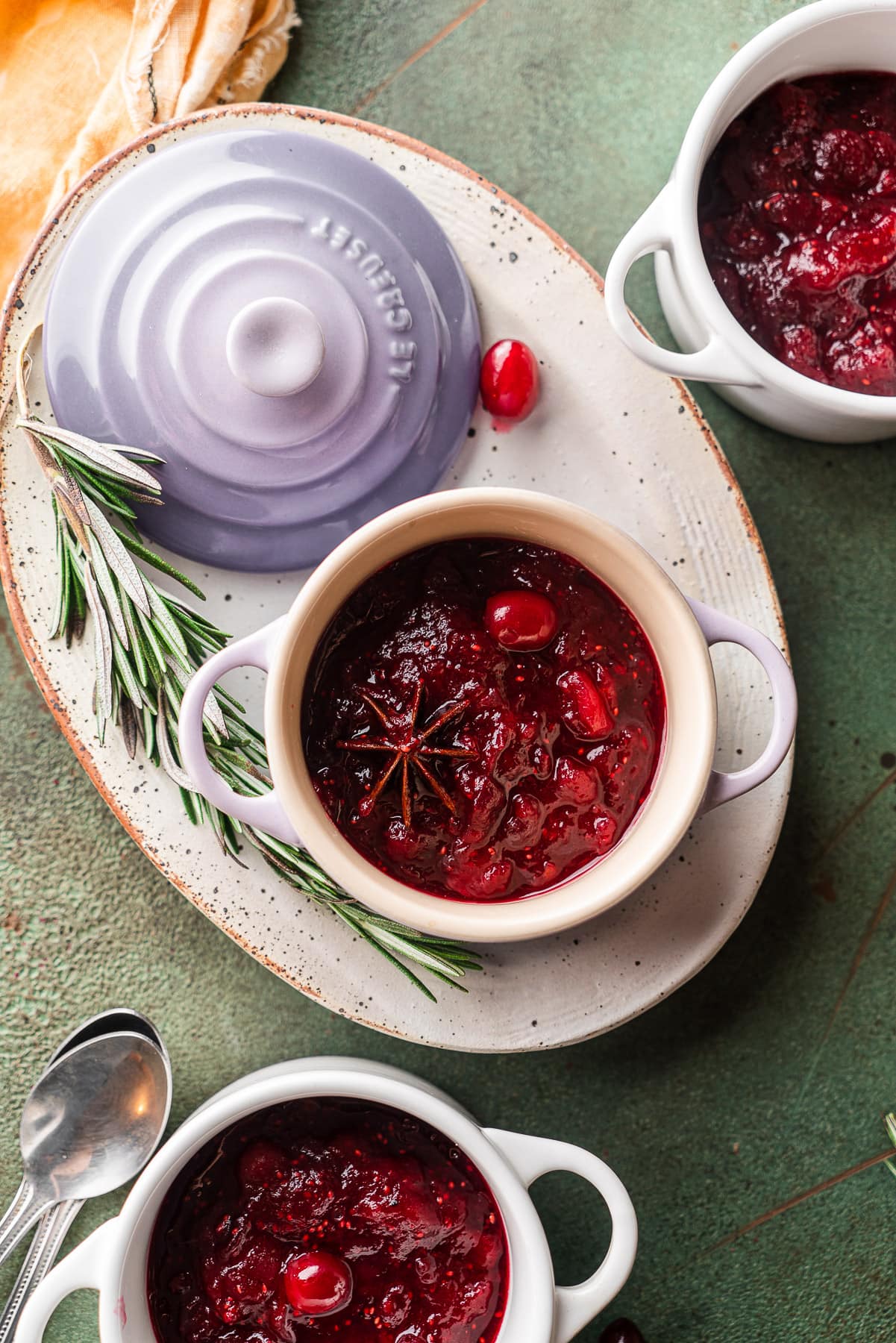 three mini cocottes with spiced ginger cranberry sauce