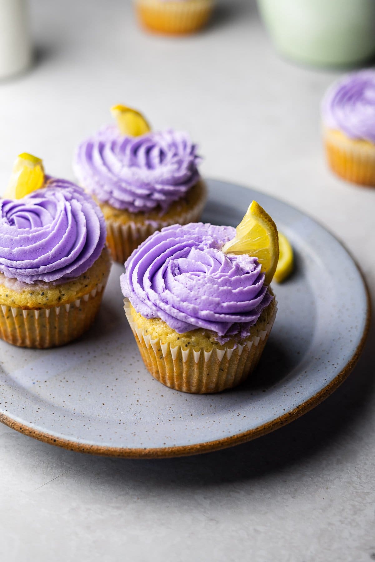 plate full of lemon poppyseed cupcakes