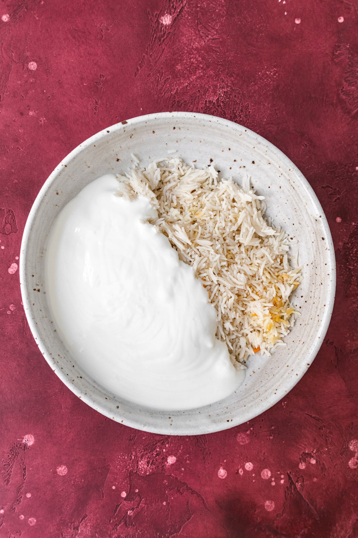 curd yogurt in a bowl with day old restaurant rice