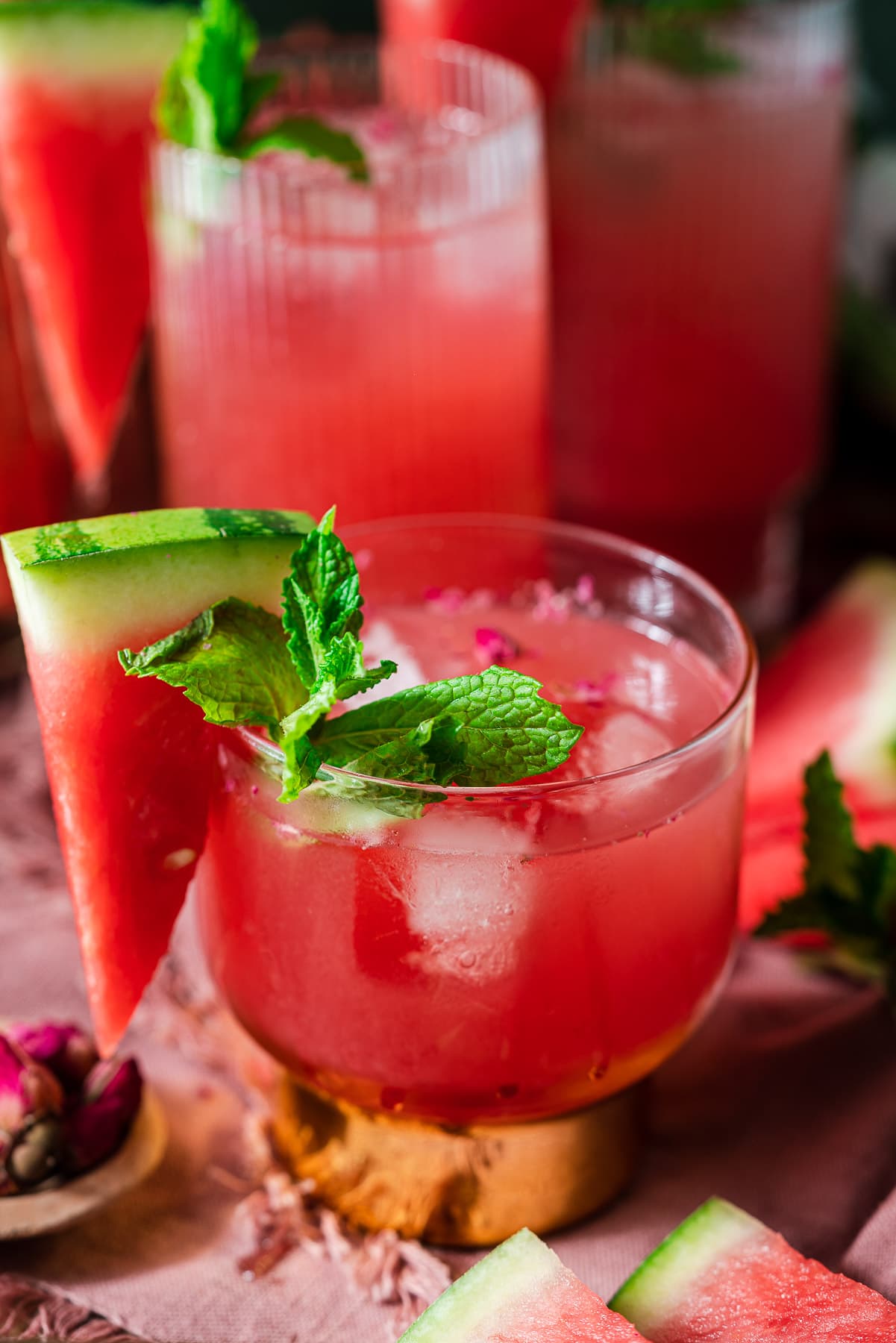 glass full of watermelon rose cooler with a watermelon garnish