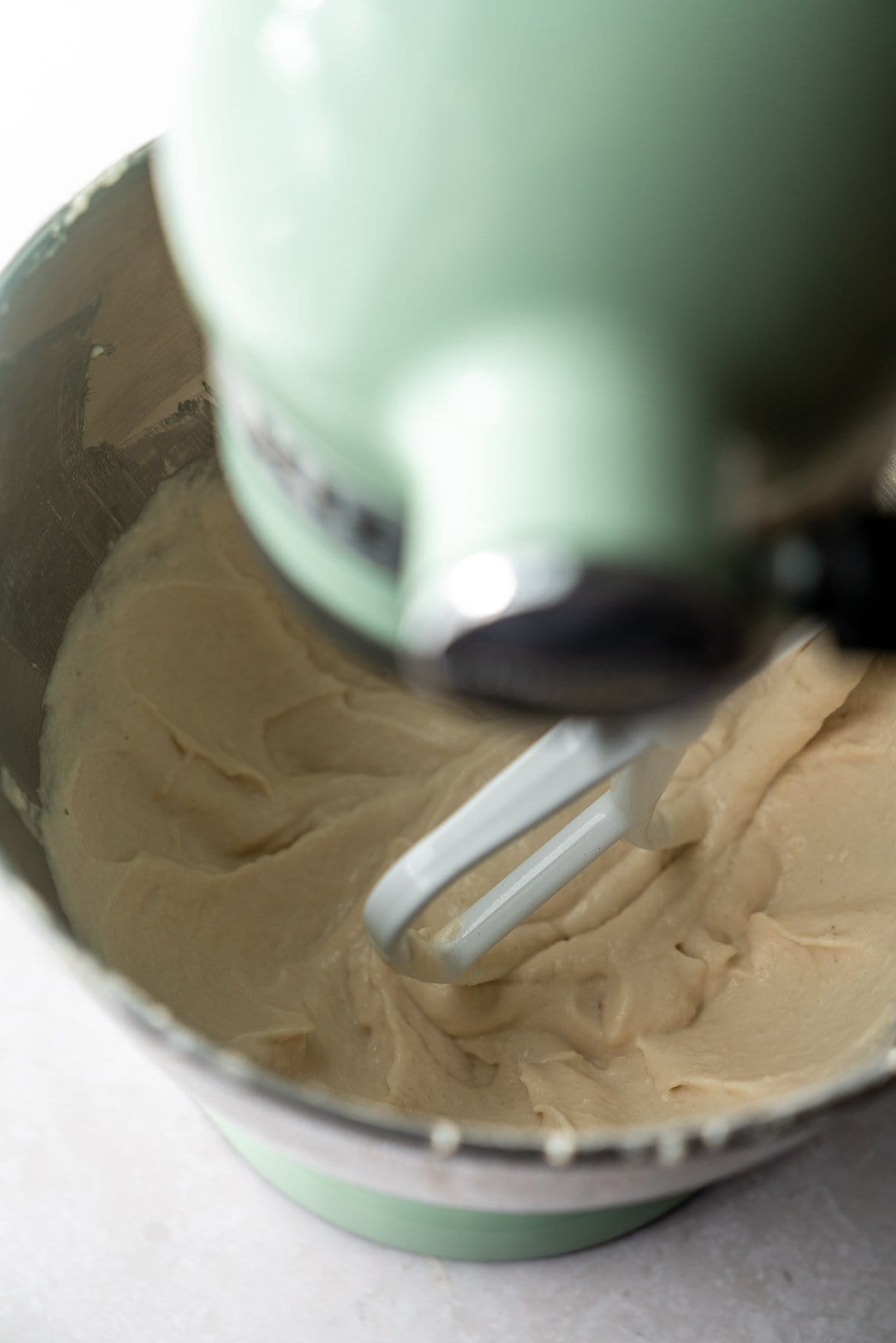 dahi vada batter in a kitchenaid whipping for aeration