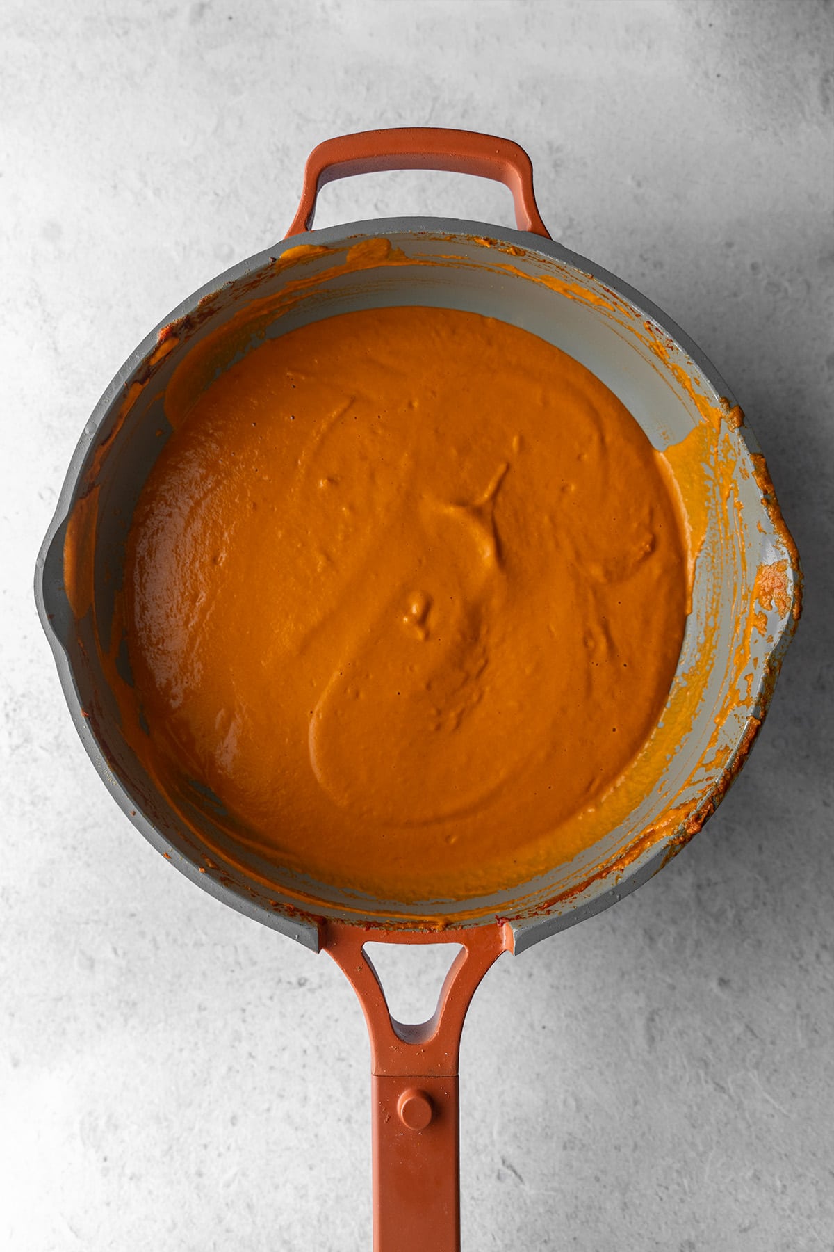 pan filled with smooth creamy makhani sauce