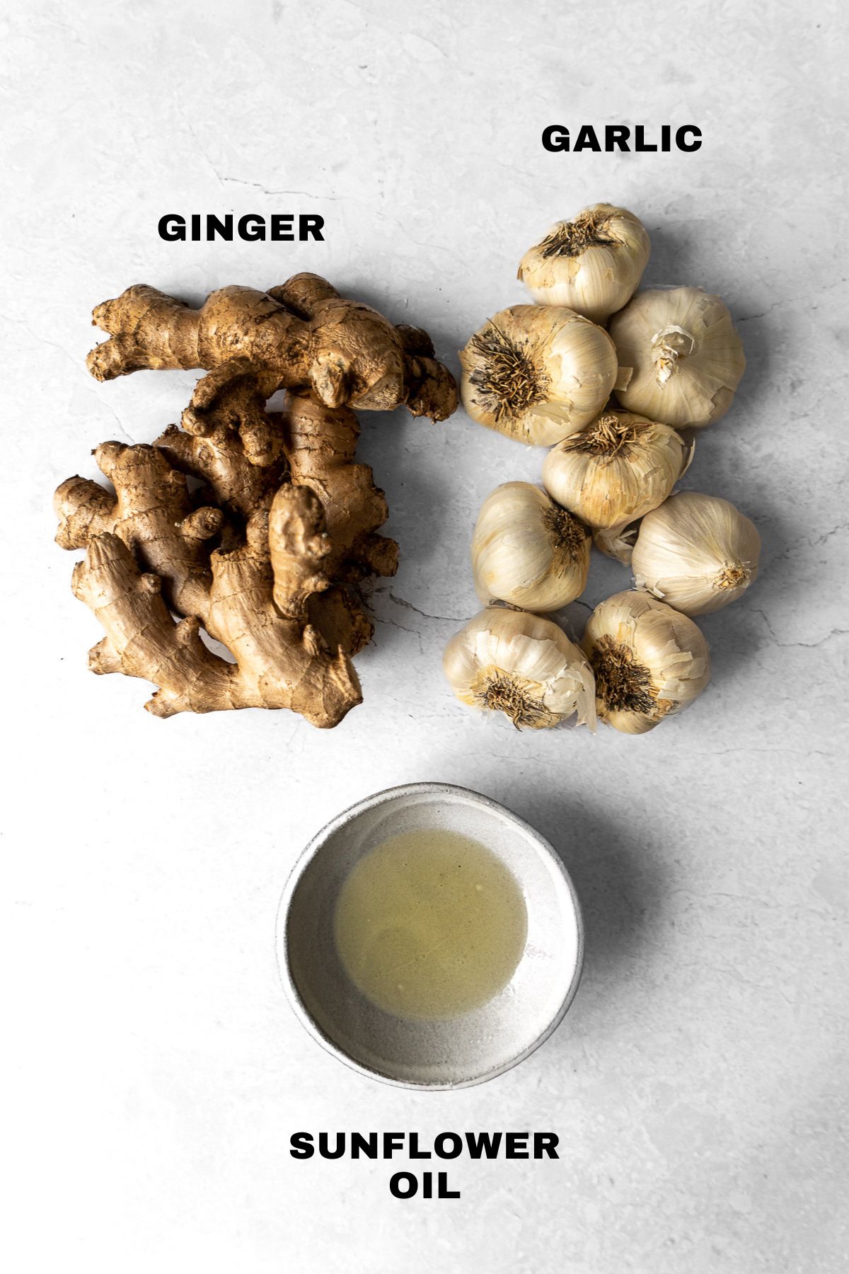 Ingredients for Ginger Garlic Paste with labels.
