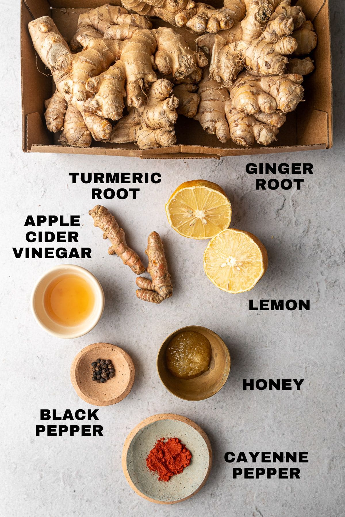 Ingredients for a Ginger shot with labels.