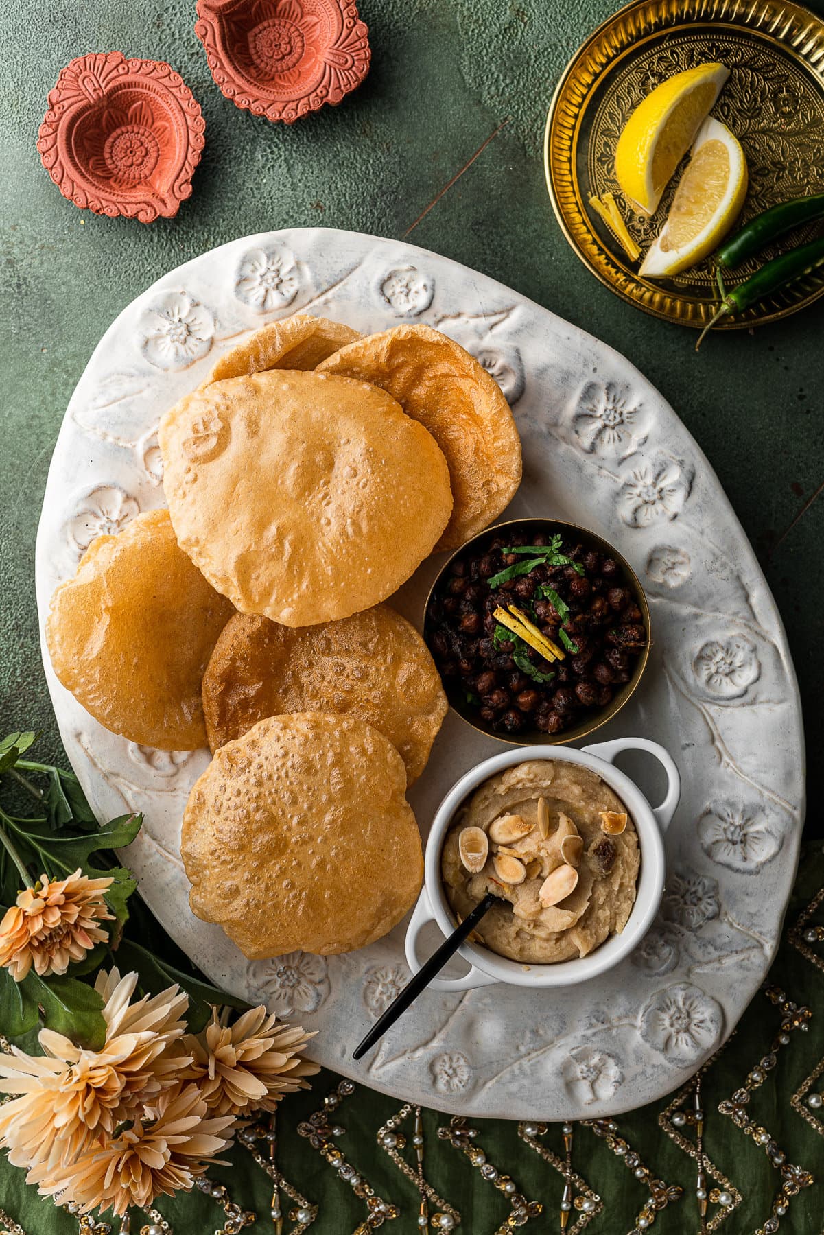 Halwa, puris, and chana in a decorative platter for Navratri