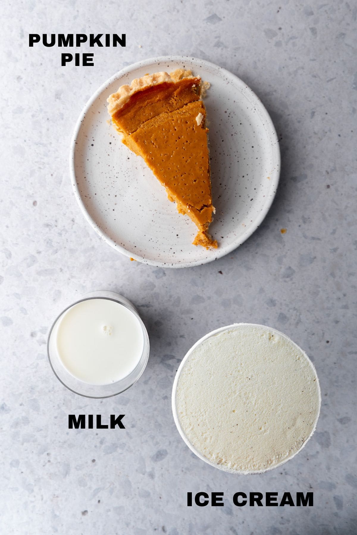 ingredients for a pumpkin pie milkshake with labels.