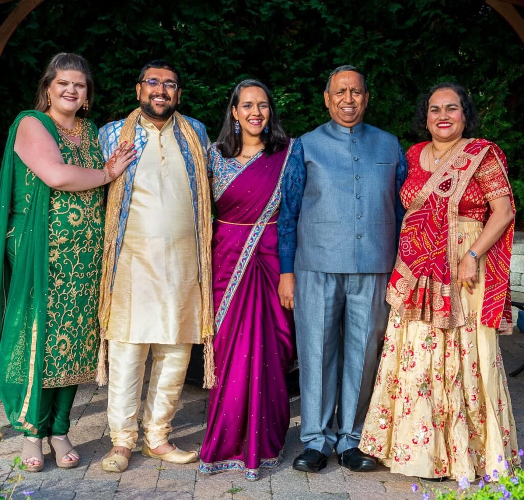Shweta's sister in law, brother, father, and mother in Indian clothes