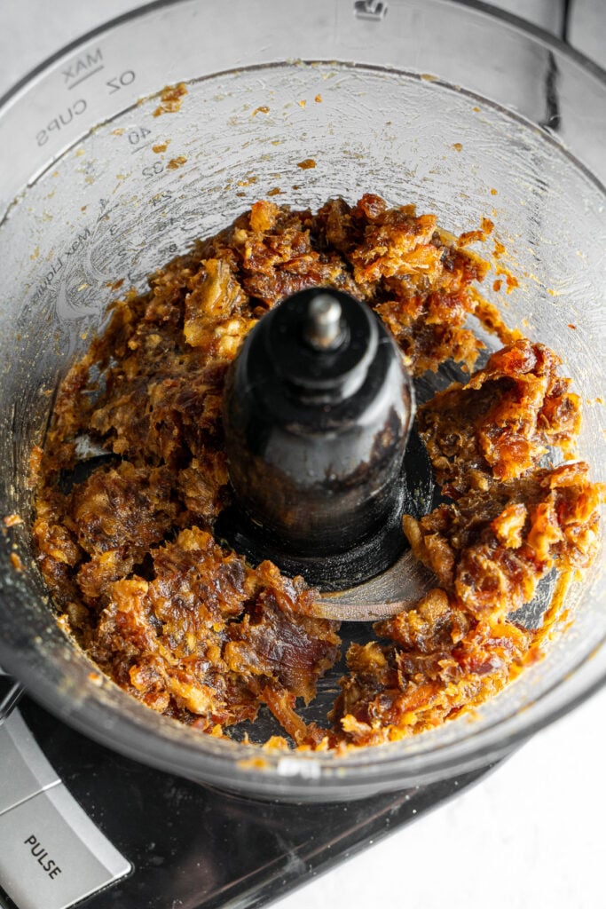 Medjool Dates pulsed into a paste in a food processor.