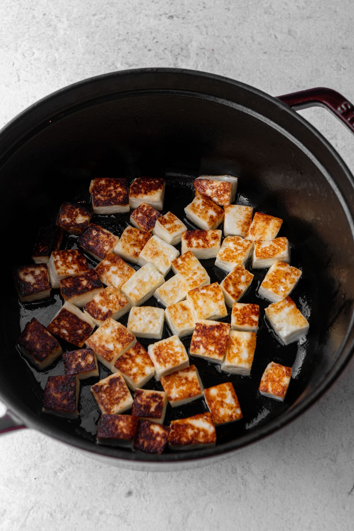 Fried Paneer in a dutch oven.