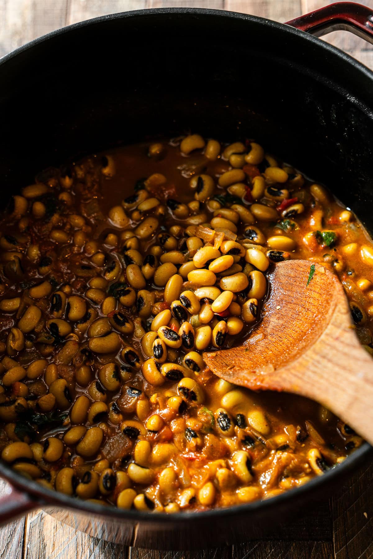 Cooked black eyed peas curry in a cocotte.