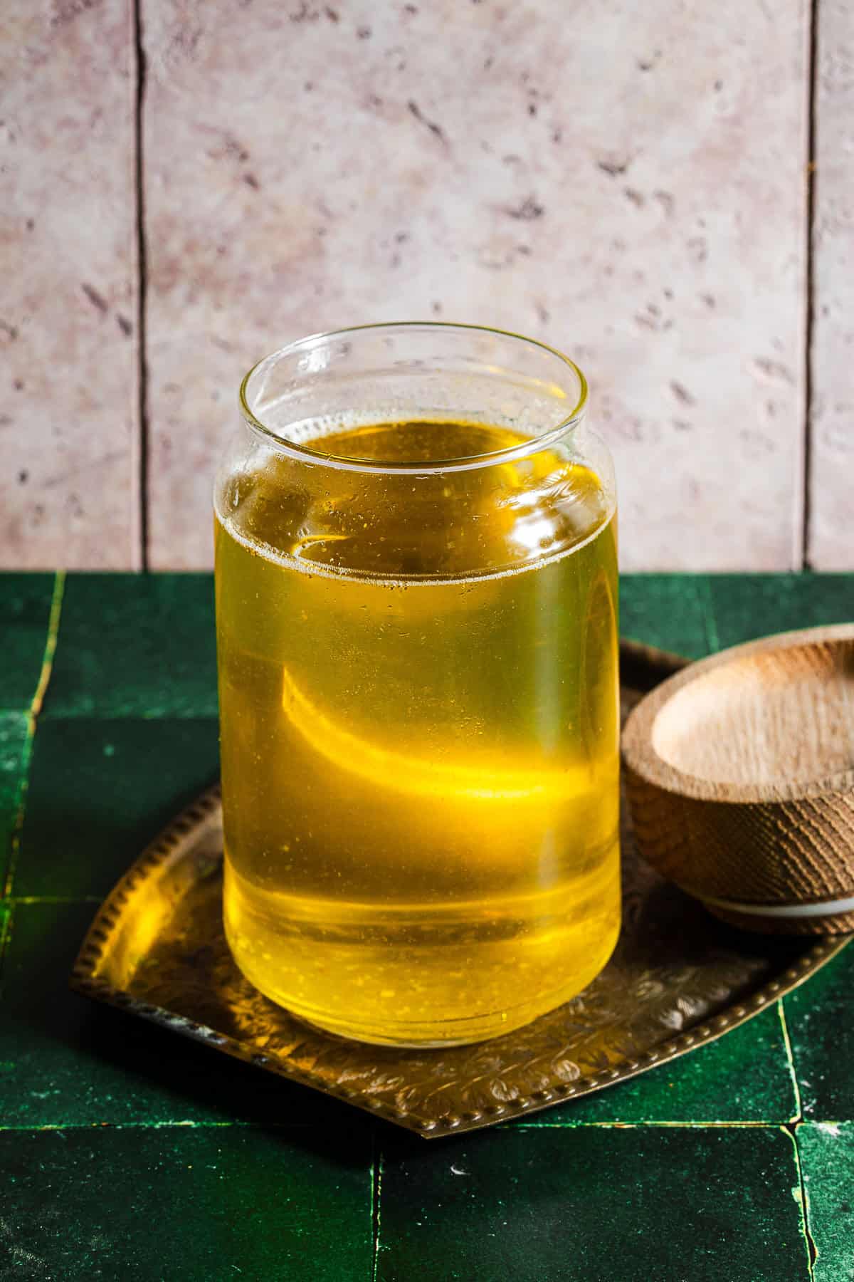 Homemade ghee in a glass jar.