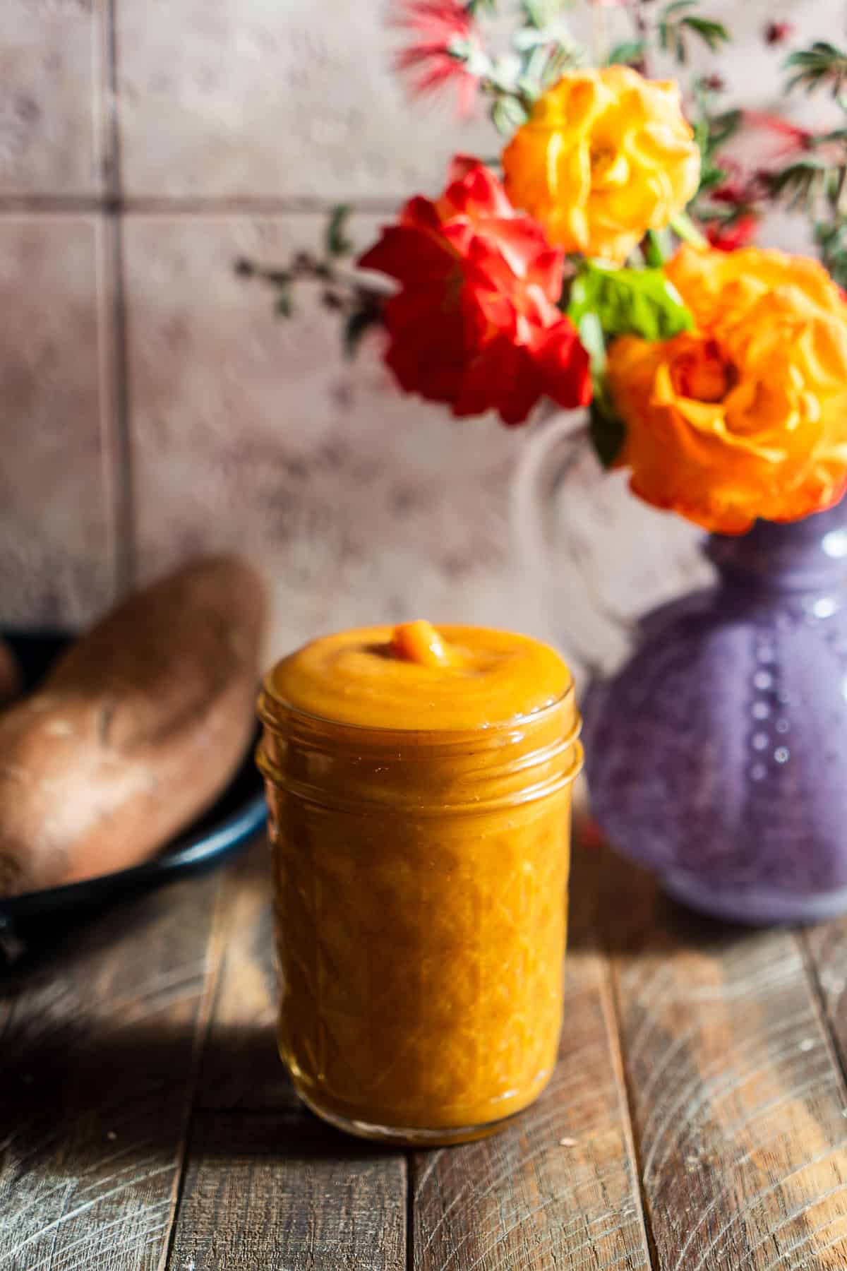 Sweet potato syrup in a jar.