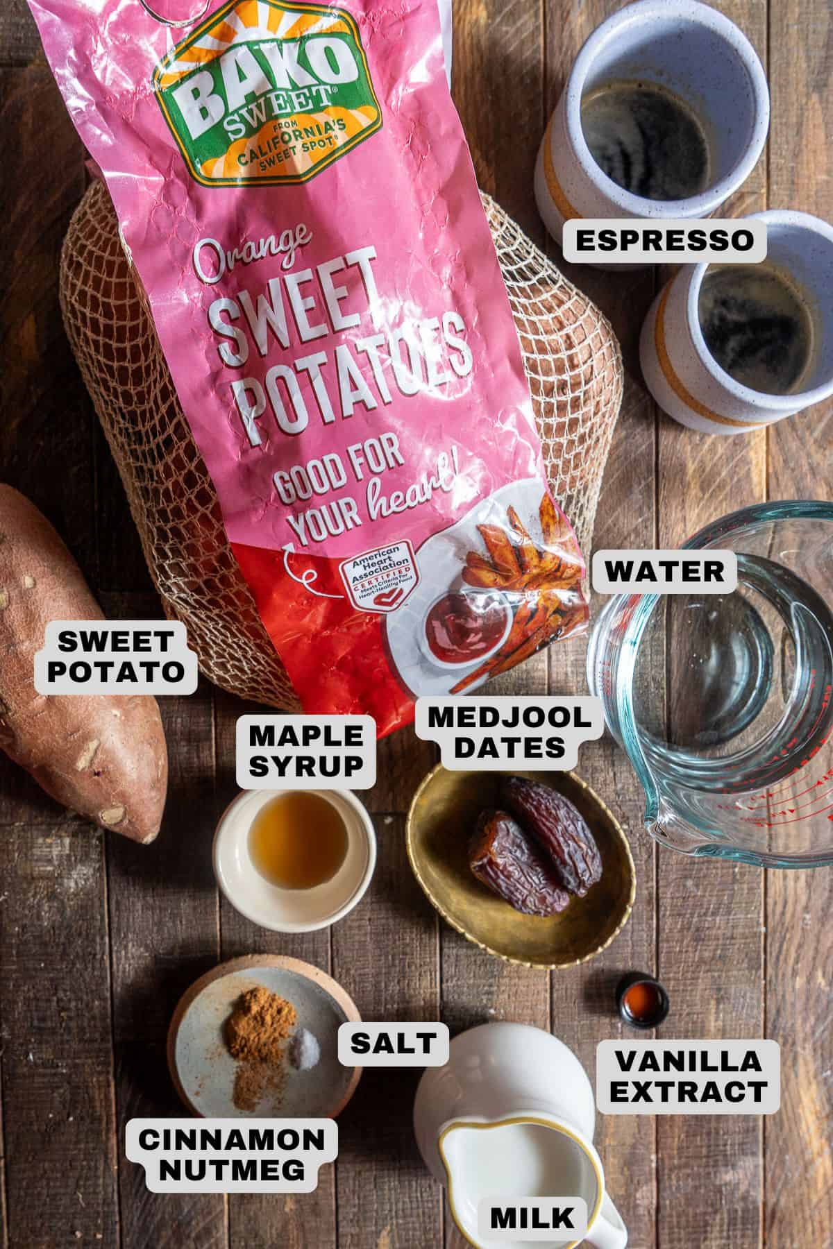 Espresso, water, Medjool dates, maple syrup, sweet potato, salt, cinnamon, nutmeg, milk, vanilla extract ingredients with labels.