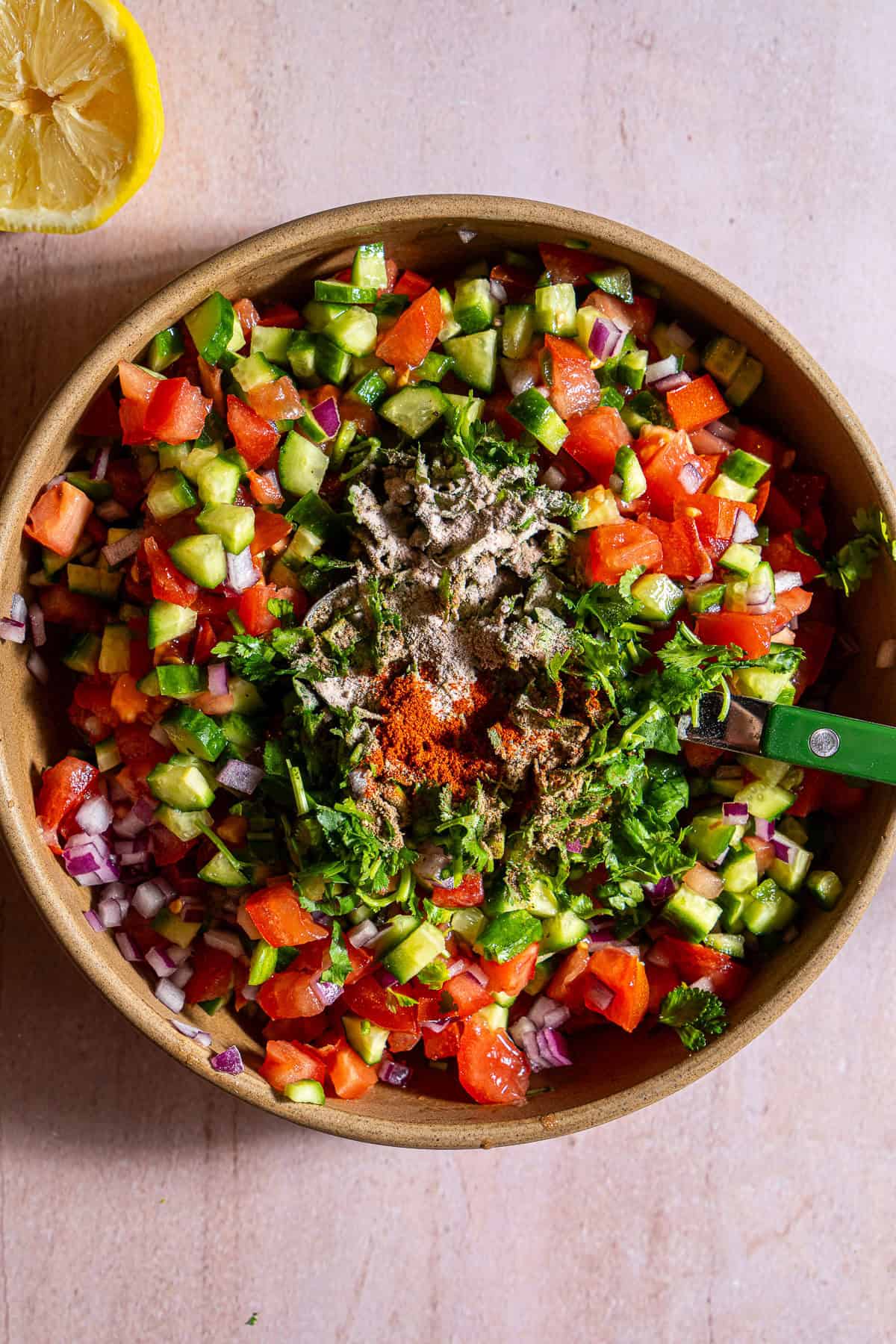 Kachumber Salad with spices and cilantro.
