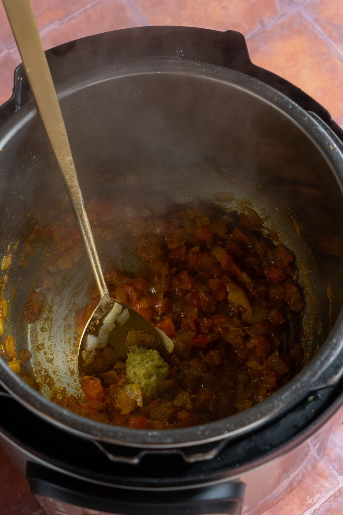 Onion tomato masala in an Instant Pot.