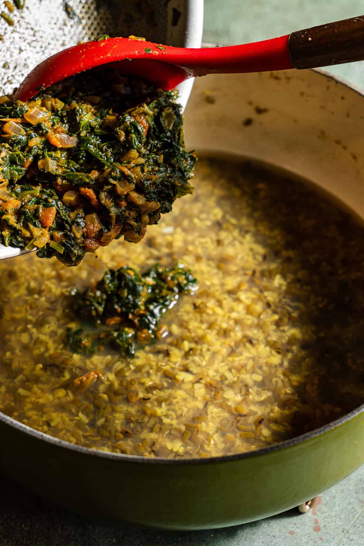 Spinach tomato tadka added to boiled moong dal.